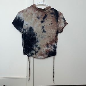 Got it from a thrift store but is from heart hips, size S. Beige,white,navy blue